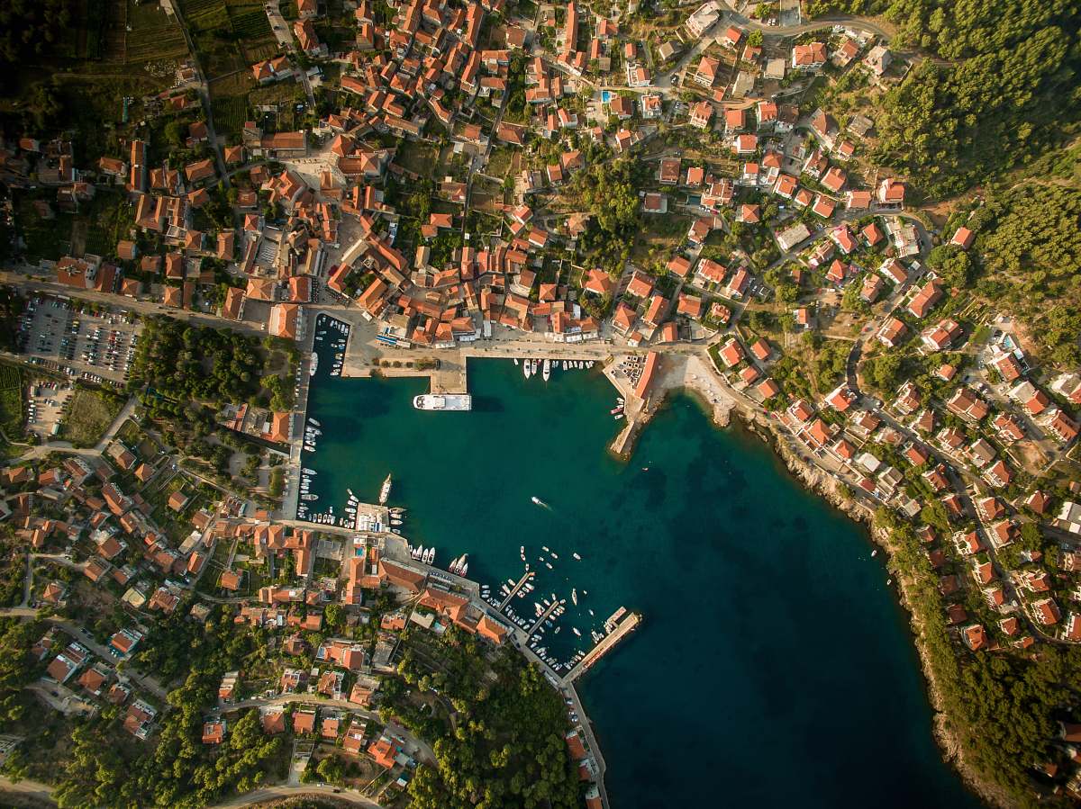 aerial view aerial photo of body of water and buildings at daytime croatia